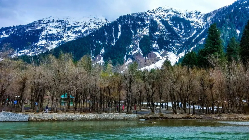Pahalgam riverbank and snow peaks